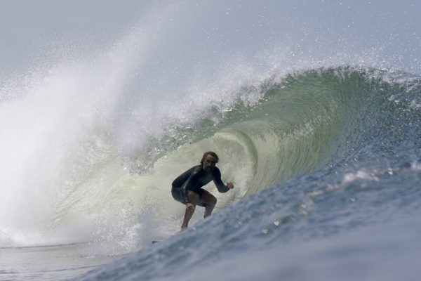 Surfer getting barrelled at Puerto Sandino – Sirena Surf Lodge