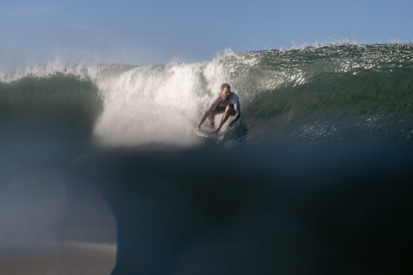 Surfer pulling into the barrel – Sirena Surf Lodge